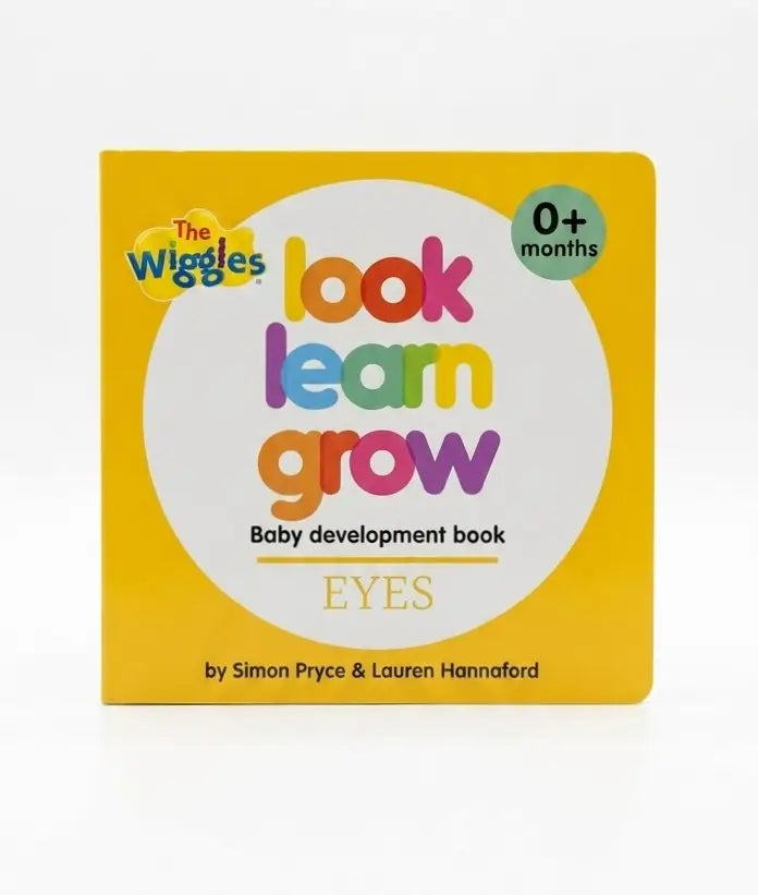 The Wiggles 'look learn grow' baby development book about eyes, featuring a bright yellow cover with a large white circle and colorful title text, photographed on a white background.