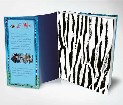 Open book with blue interior pages and black and white zebra-striped cover