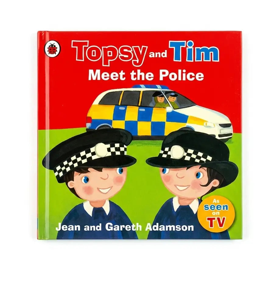 Children's hardcover book titled 'Topsy and Tim Meet the Police' with illustrated police officers and a blue-and-yellow police car on the cover, photographed against a plain white background.
