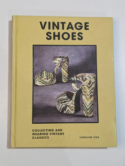 Book titled 'Vintage Shoes' by Caroline Cox with a cover photo of vintage high-heeled shoes.