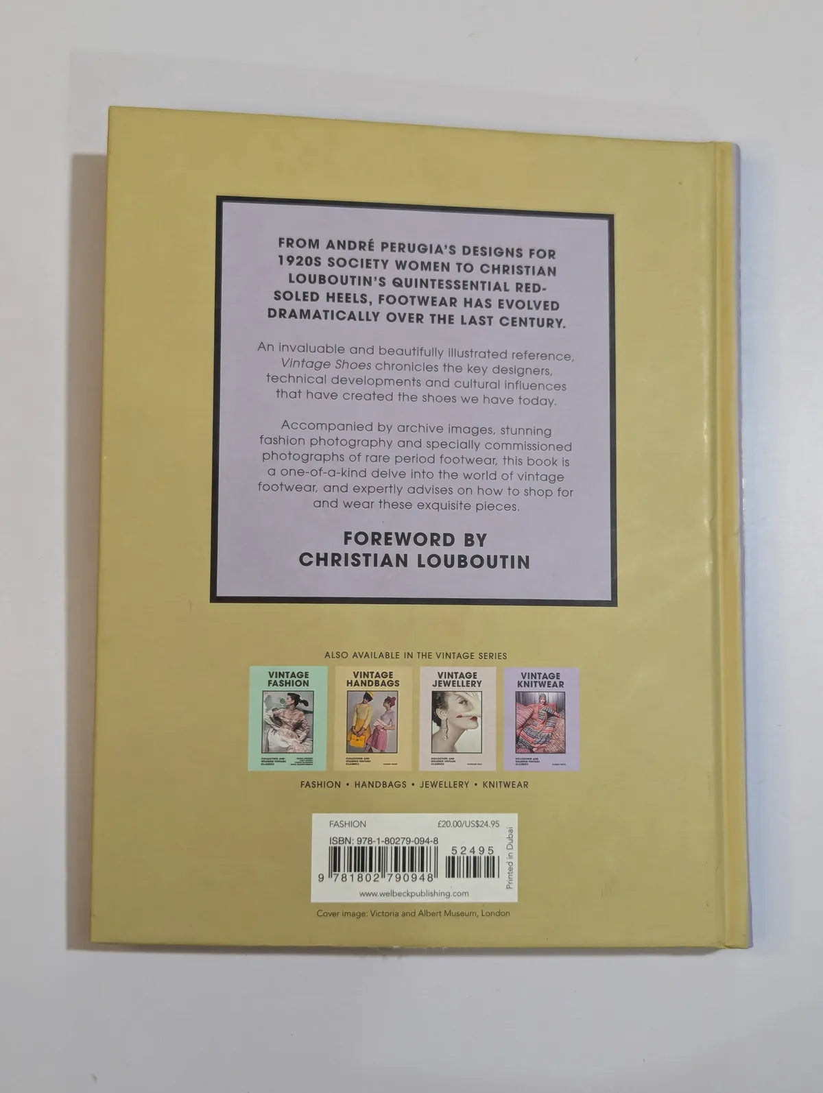 Back cover of a book with text and small images on a beige background
