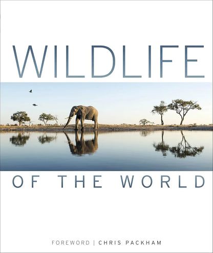 Book cover of 'Wildlife of the World' with an elephant at a watering hole.
