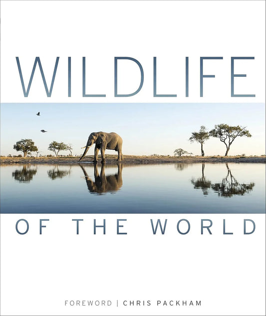 Book cover of 'Wildlife of the World' with an elephant at a watering hole.