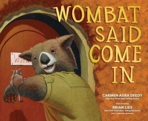 Book cover of 'Wombat Said Come In' with a cartoon wombat and mouse at a door.